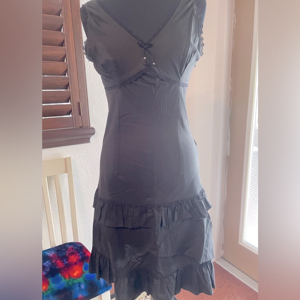 Black cotton dress with layer tiered bottom Size L fits about size 8.